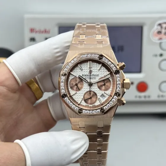 Audemars Piguet Royal Oak Offshore Chronograph 26715BC ZZ 1356BC 01 rose gold case and bracelet diamond bezel silver dial with rose gold subdials 38mm Women s Automatic