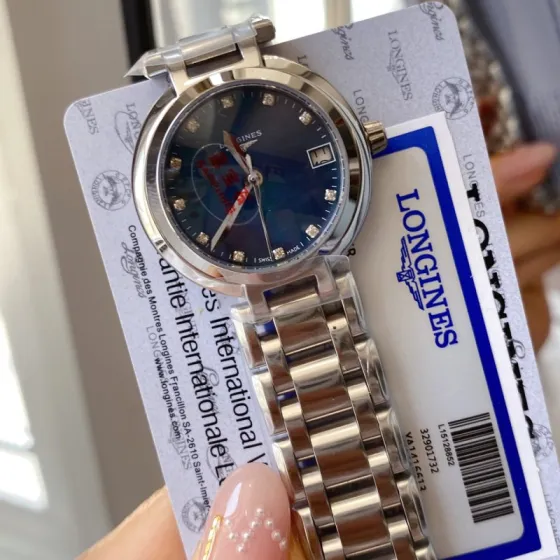 Longines Flagship steel case and bracelet blue dial silver bezel 35mm Women s Automatic