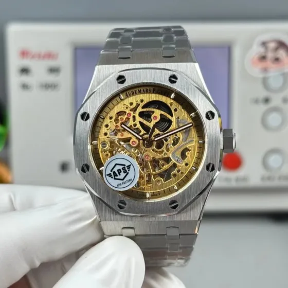 Audemars Piguet Royal Oak Double Balance Wheel Openworked 15407ST OO 1220ST 01 stainless steel case and bracelet silver bezel gold skeleton dial 41mm Men s Automatic