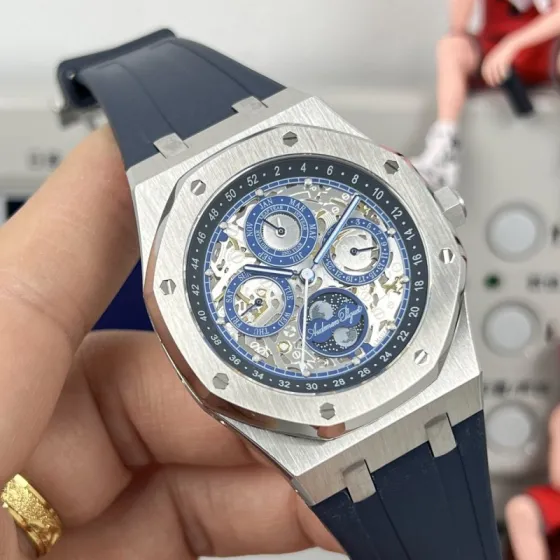 Audemars Piguet Royal Oak Perpetual Calendar Openworked 26574ST stainless steel case and bezel blue skeleton dial blue rubber strap 41mm Men s Automatic