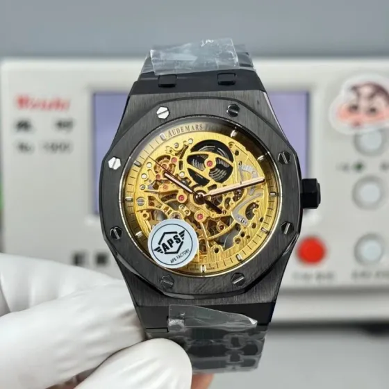 Audemars Piguet Royal Oak Double Balance Wheel Openworked 15407ST OO 1220ST 01 blackened steel case and bracelet black bezel gold skeleton dial 41mm Men s Automatic