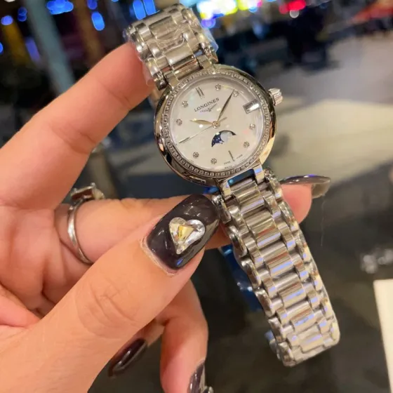 Longines PrimaLuna Moonphase silver case diamond bezel white mother-of-pearl dial silver bracelet 30mm Women s Quartz