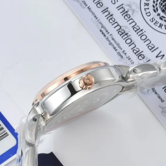 Longines Unknown silver case rose gold bezel silver dial silver strap 42mm Men s Automatic